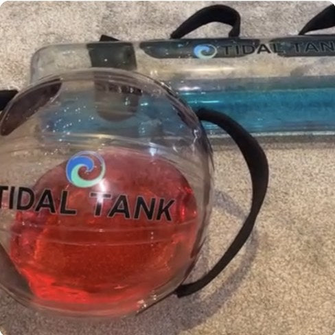 A sphere filled to the top with red-dyed water.
