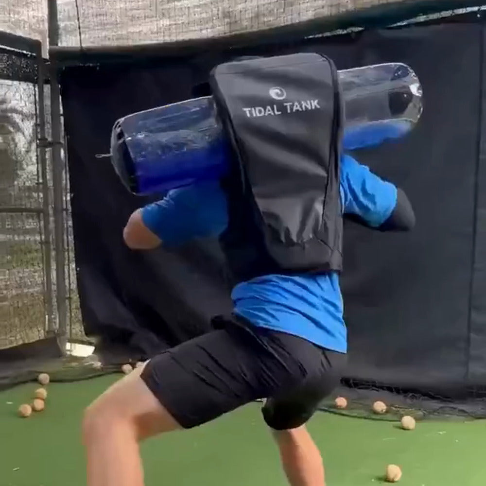 A pitcher throwing in a cage wearing a water-filled training vest