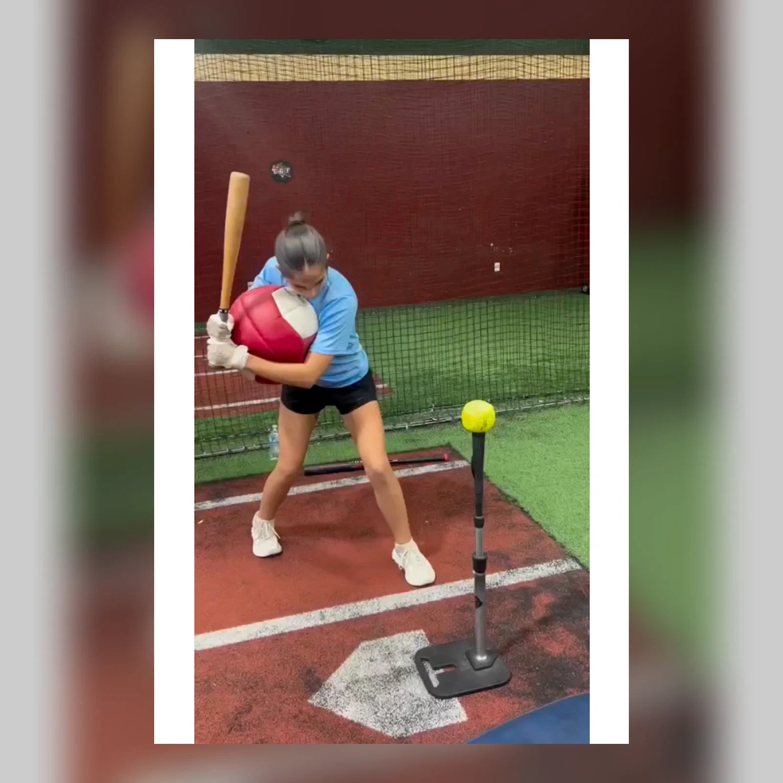 Softball athlete training with the HydroFit Sphere Trainer.